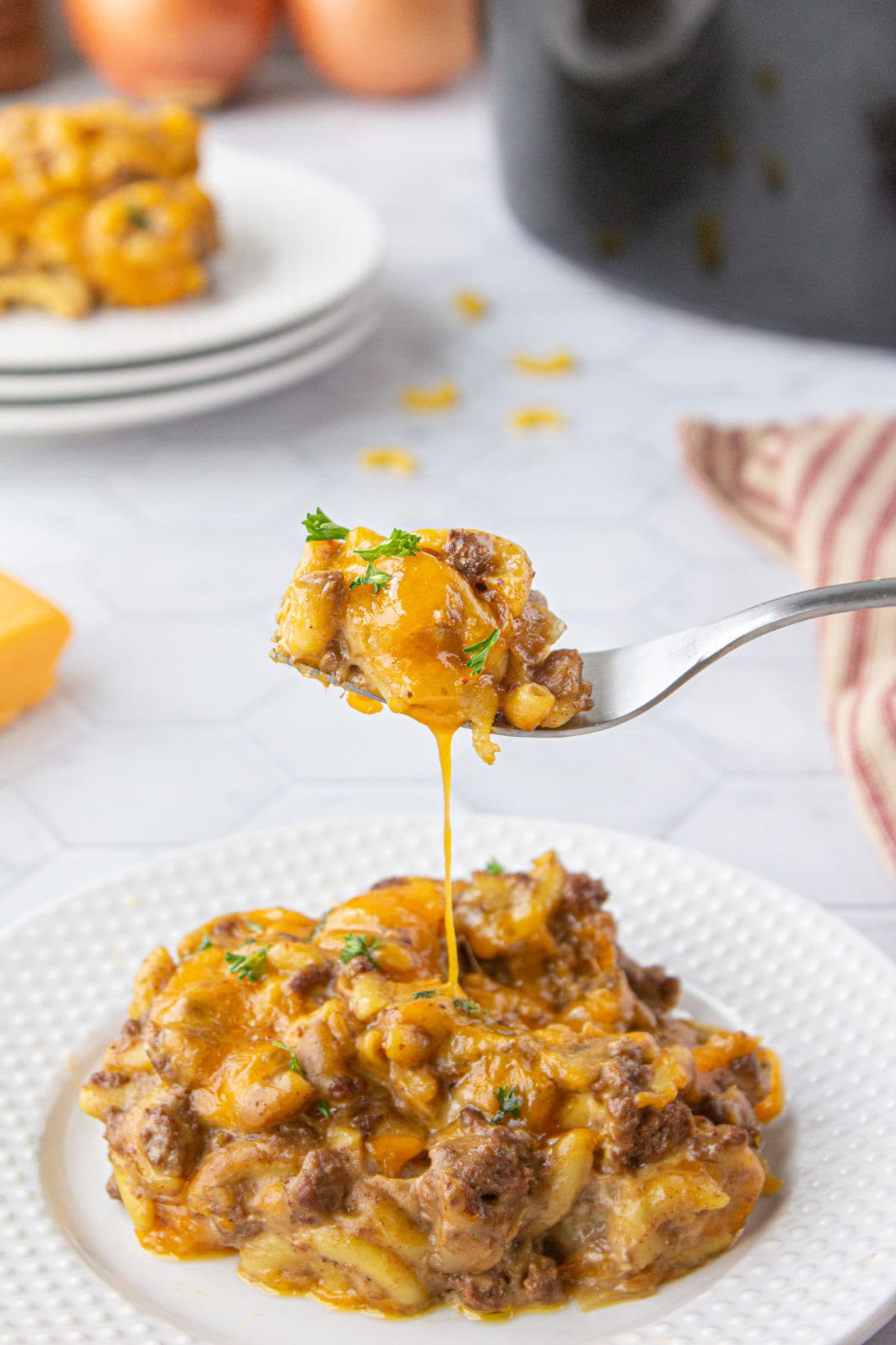 Cheesy casserole on a plate.