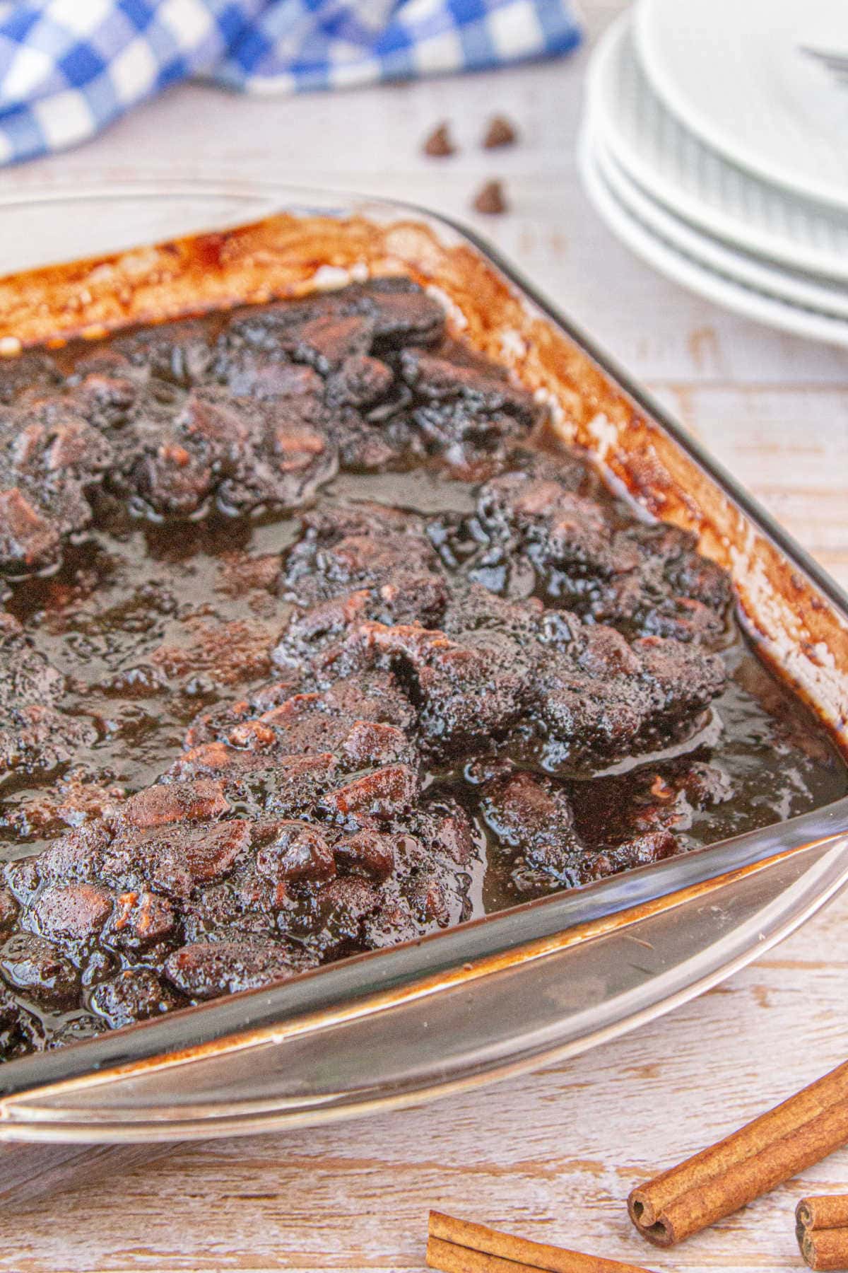 Chocolate cobbler in a glass baking pan.