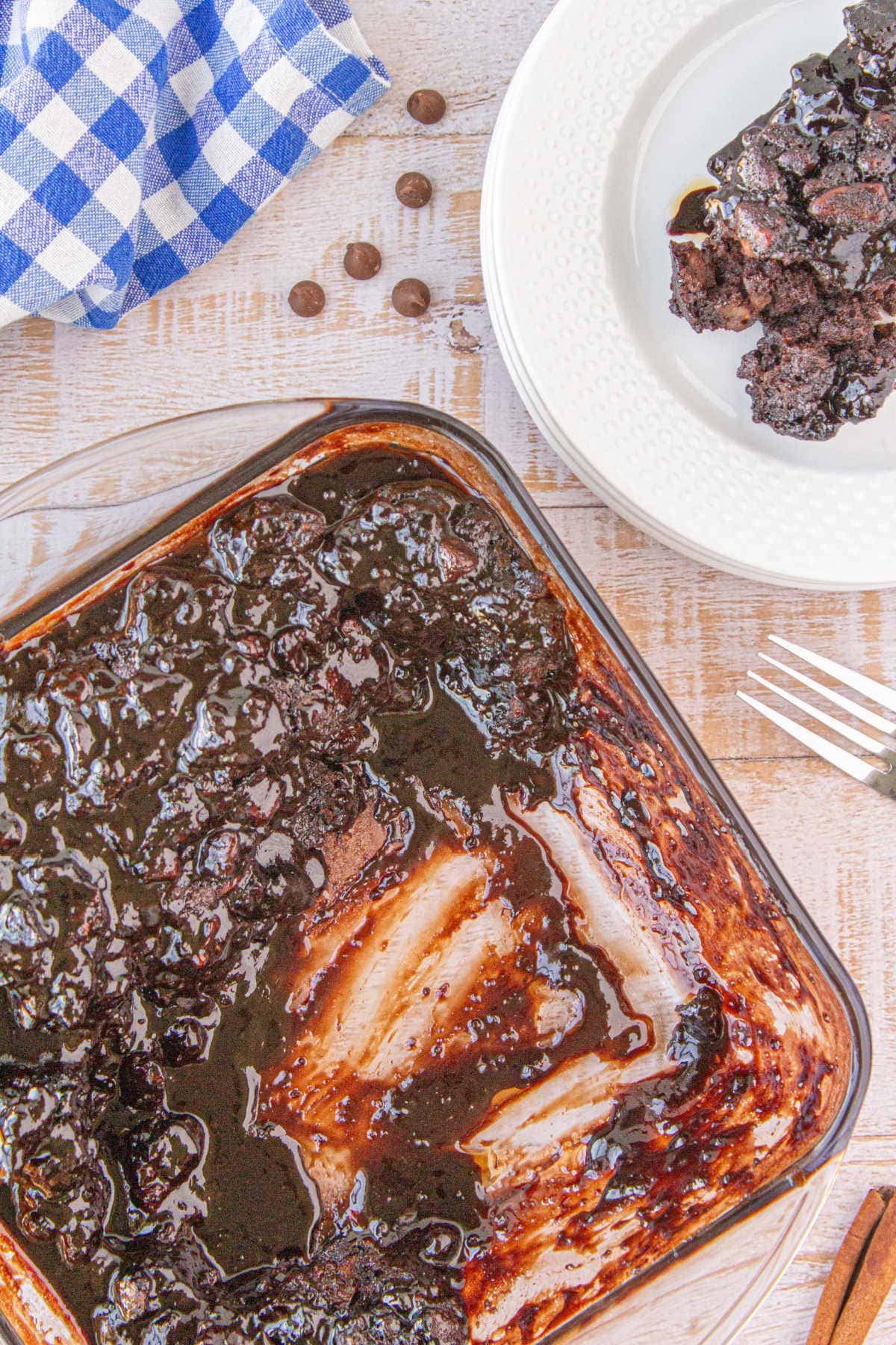 A baking dish with several servings of cobbler gone.