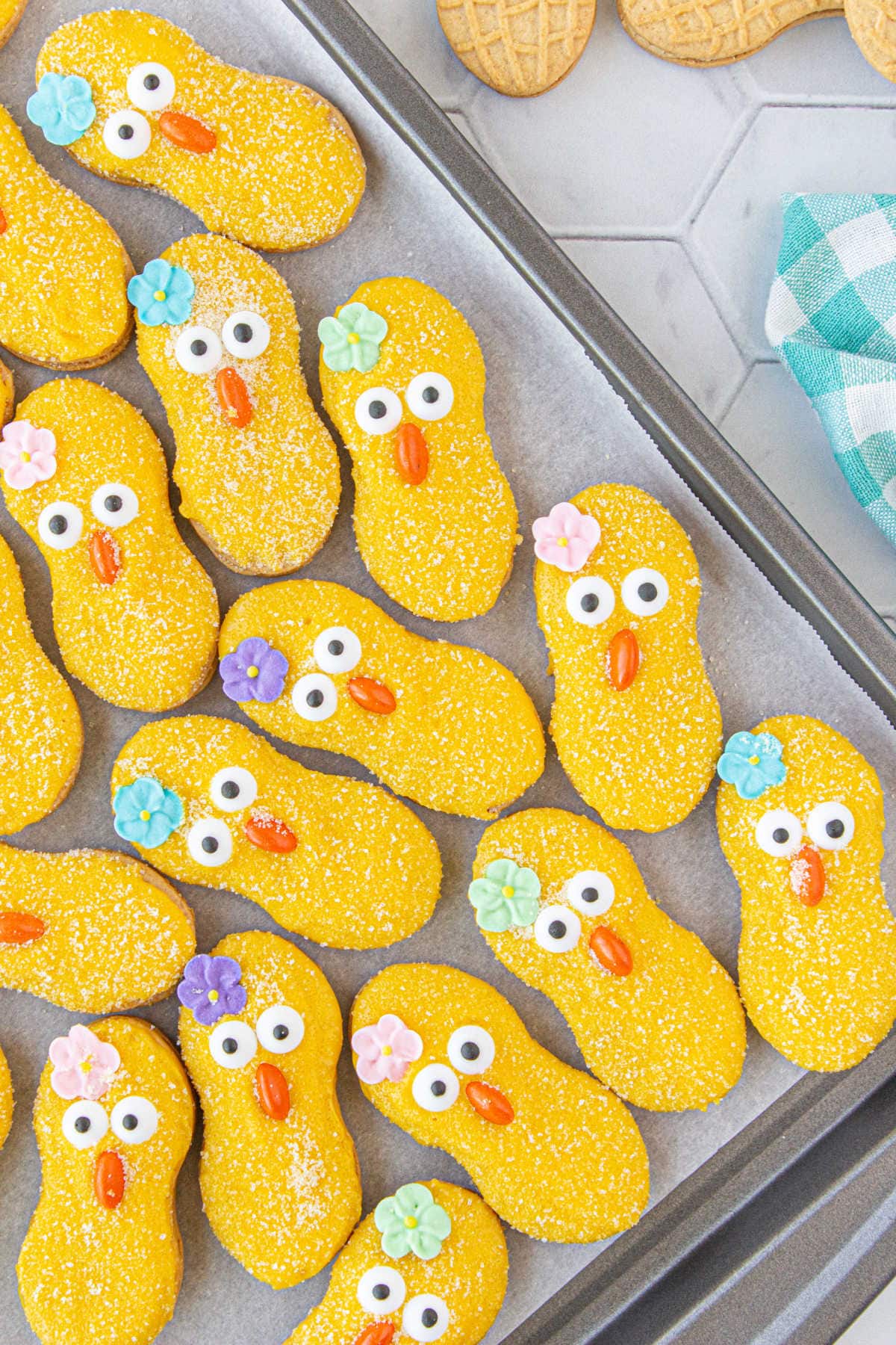 Overhead view of a baking sheet with finished cookies on it.