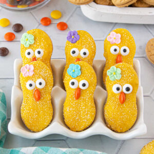 Easter chicks cookies in a dish.