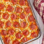 Overhead view of the casserole with pepperoni on top/