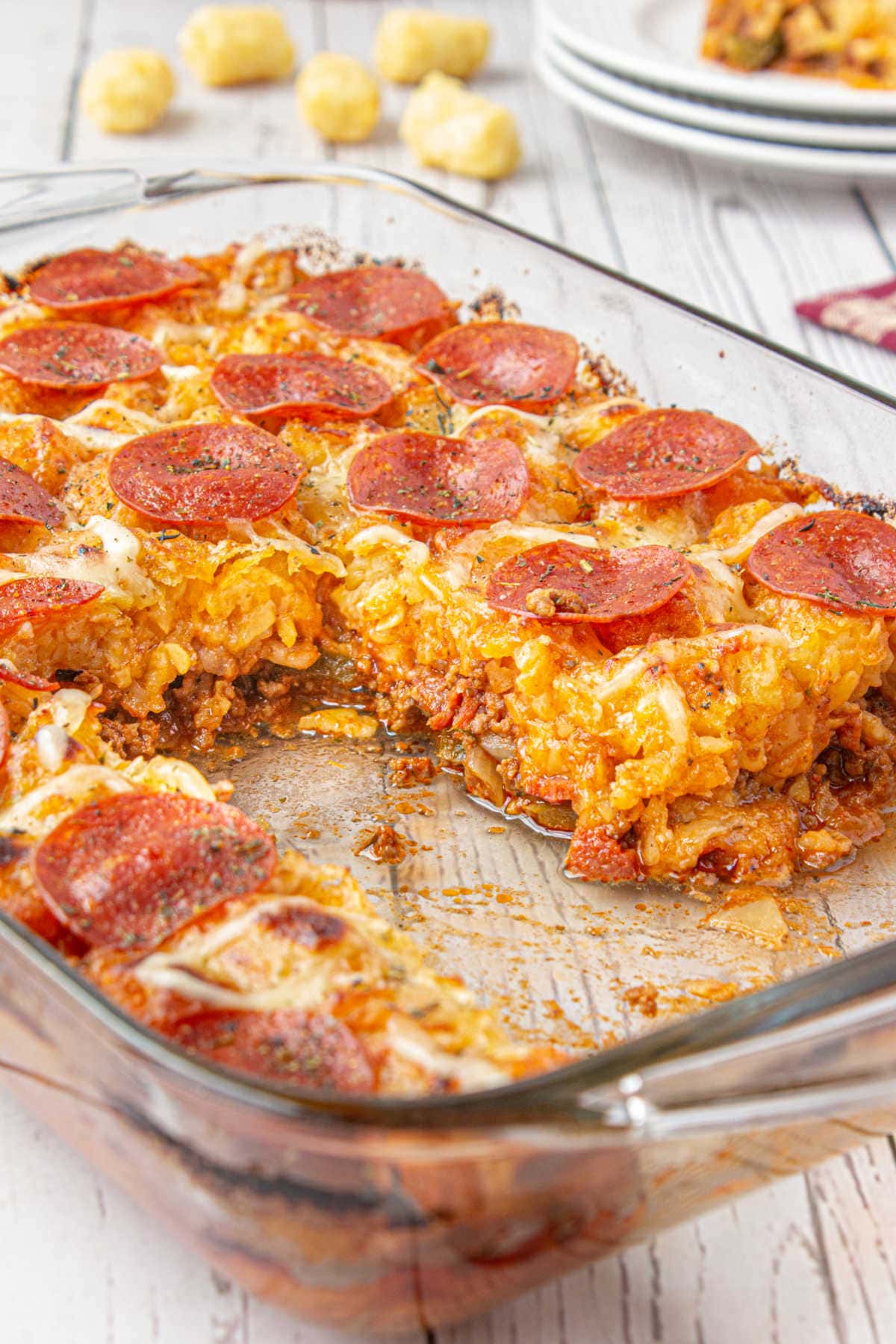 Side view of the casserole with a serving removed showing the inside texture.