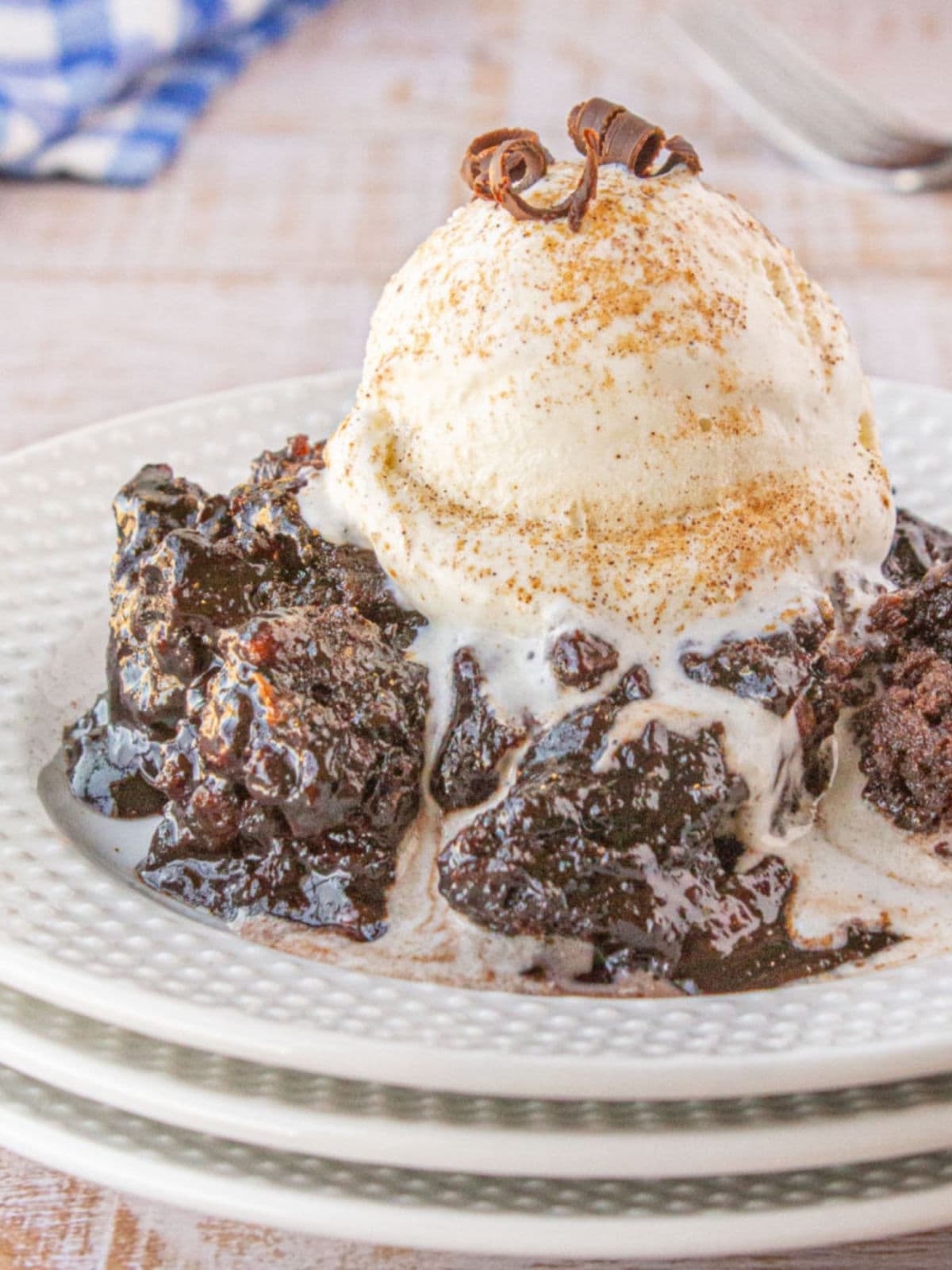 Chocolate cobbler with a scoop of vanilla ice cream.