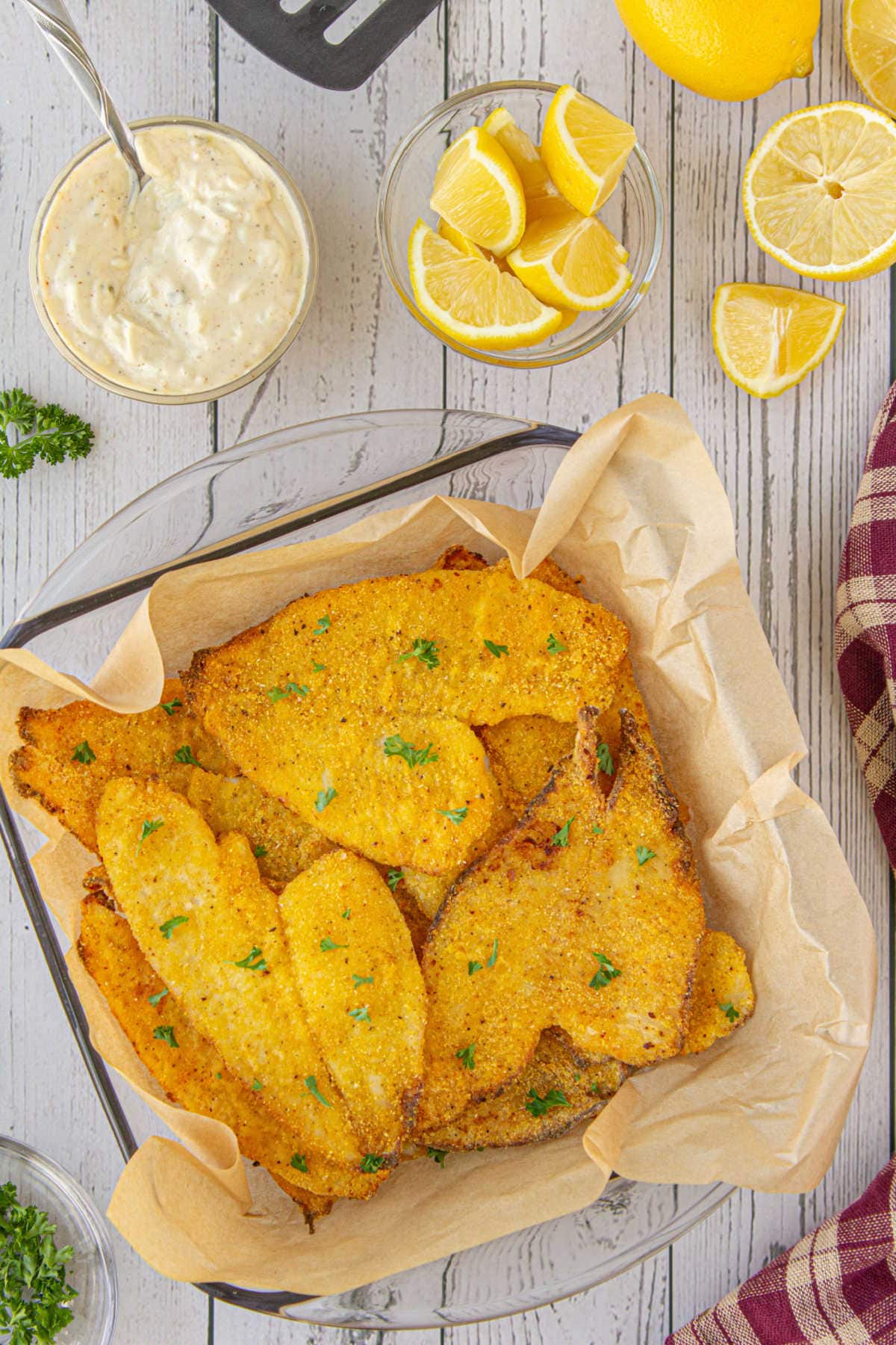 Overhead view of crispy catfish fillets.