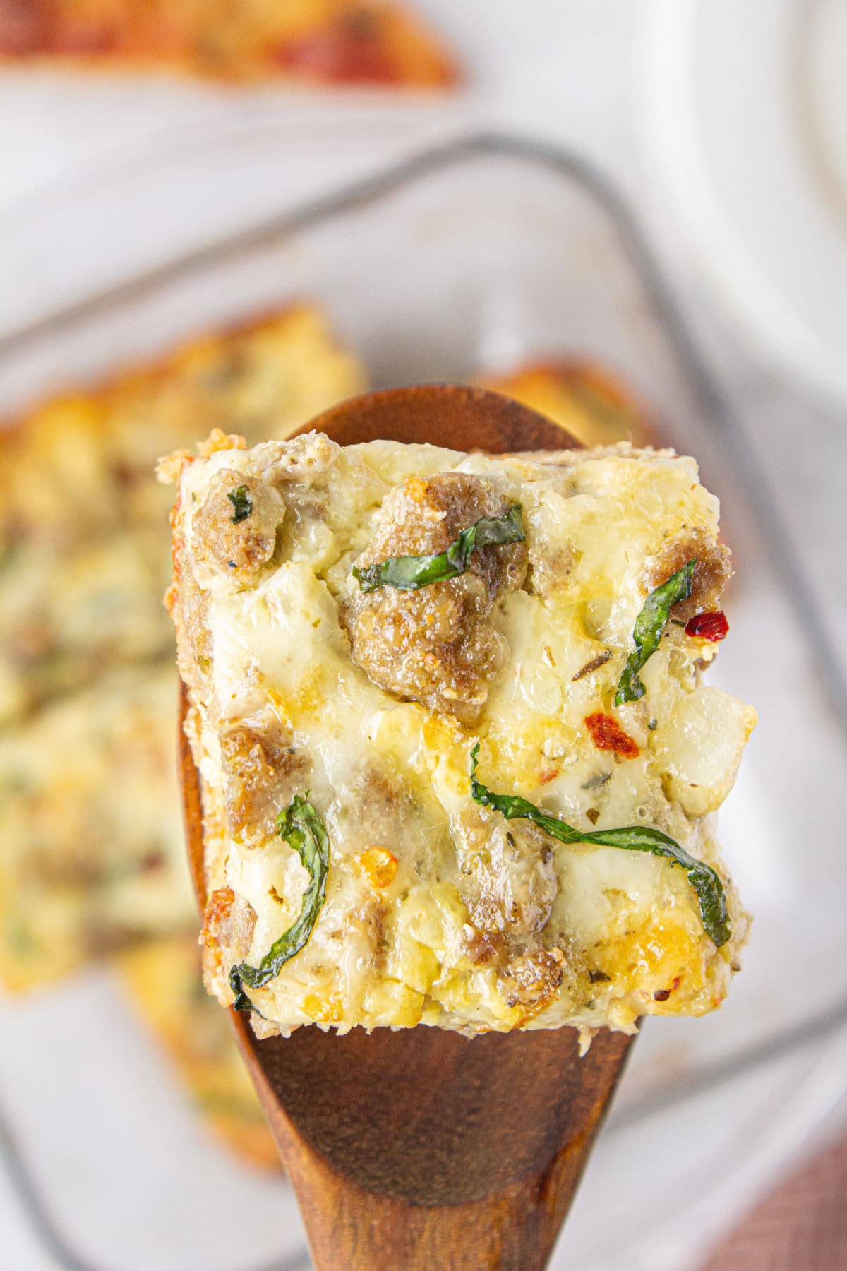 A serving of casserole on a spatula.