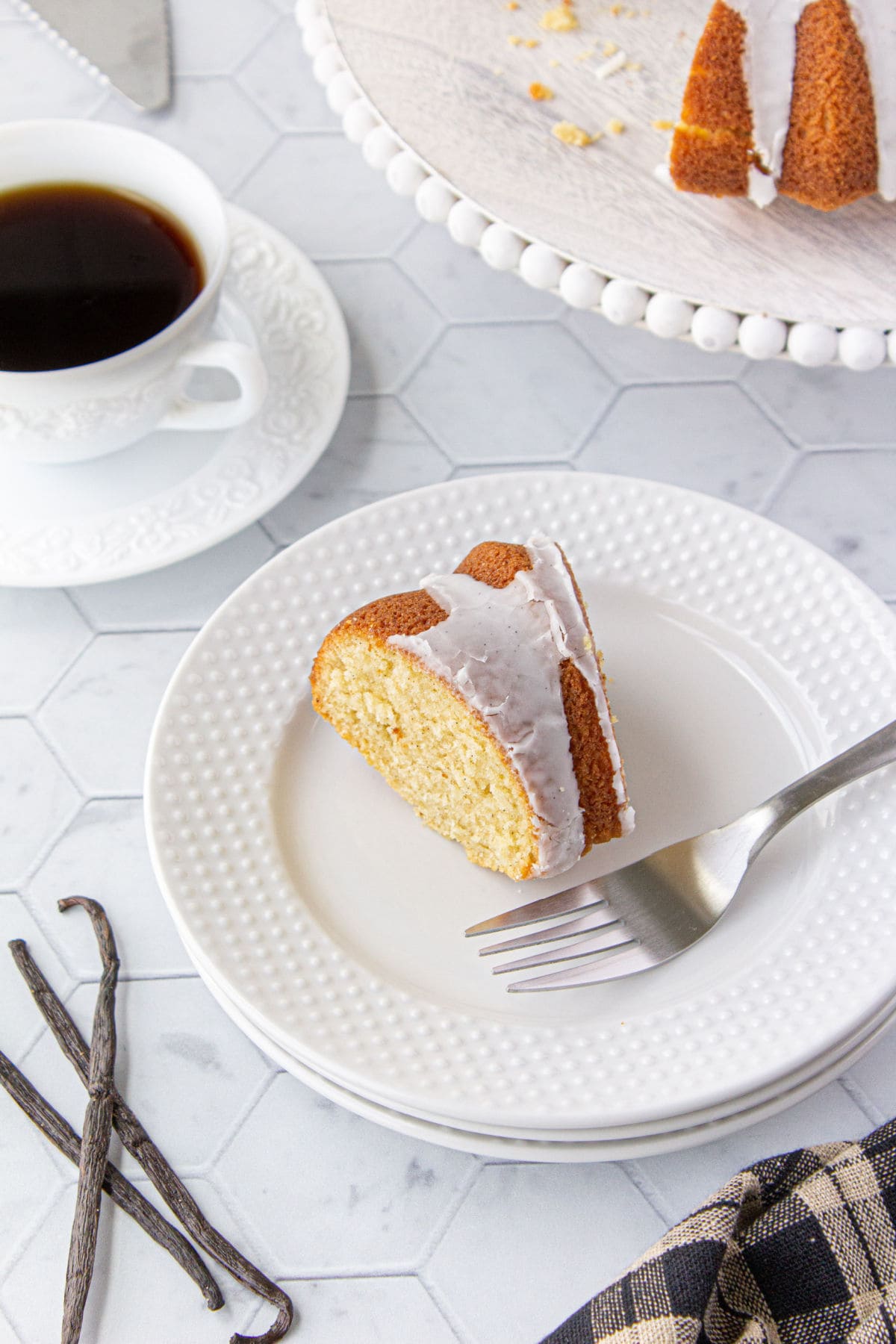 Overhead view of a serving of cake and coffee.