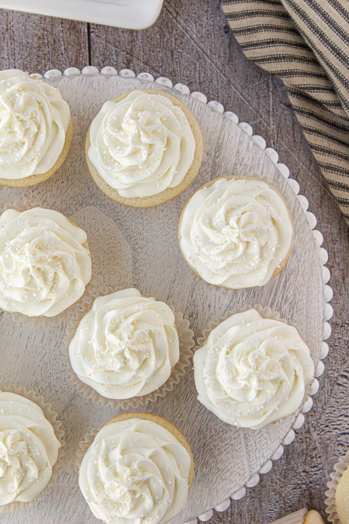 Overhead view of cupcakes on a cake plate.