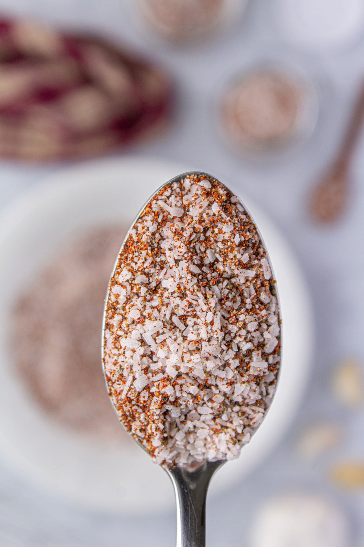 A closeup of a spoonful of the creole seasoning.