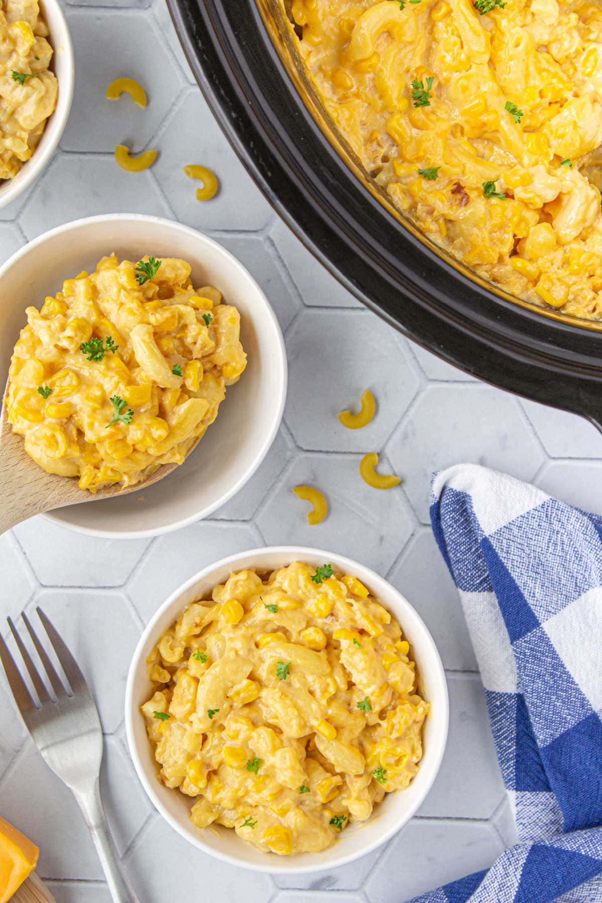 Macaroni and corn casserole served up in bowls.