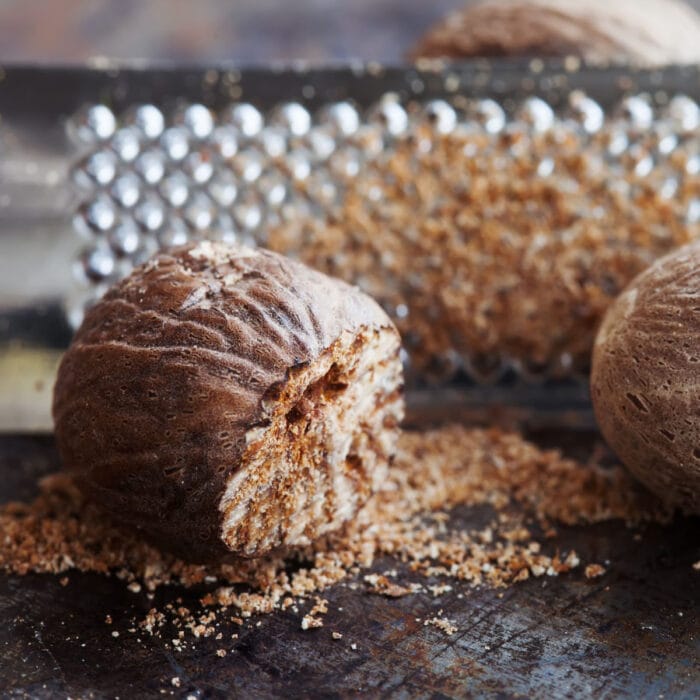 A nutmeg being grated