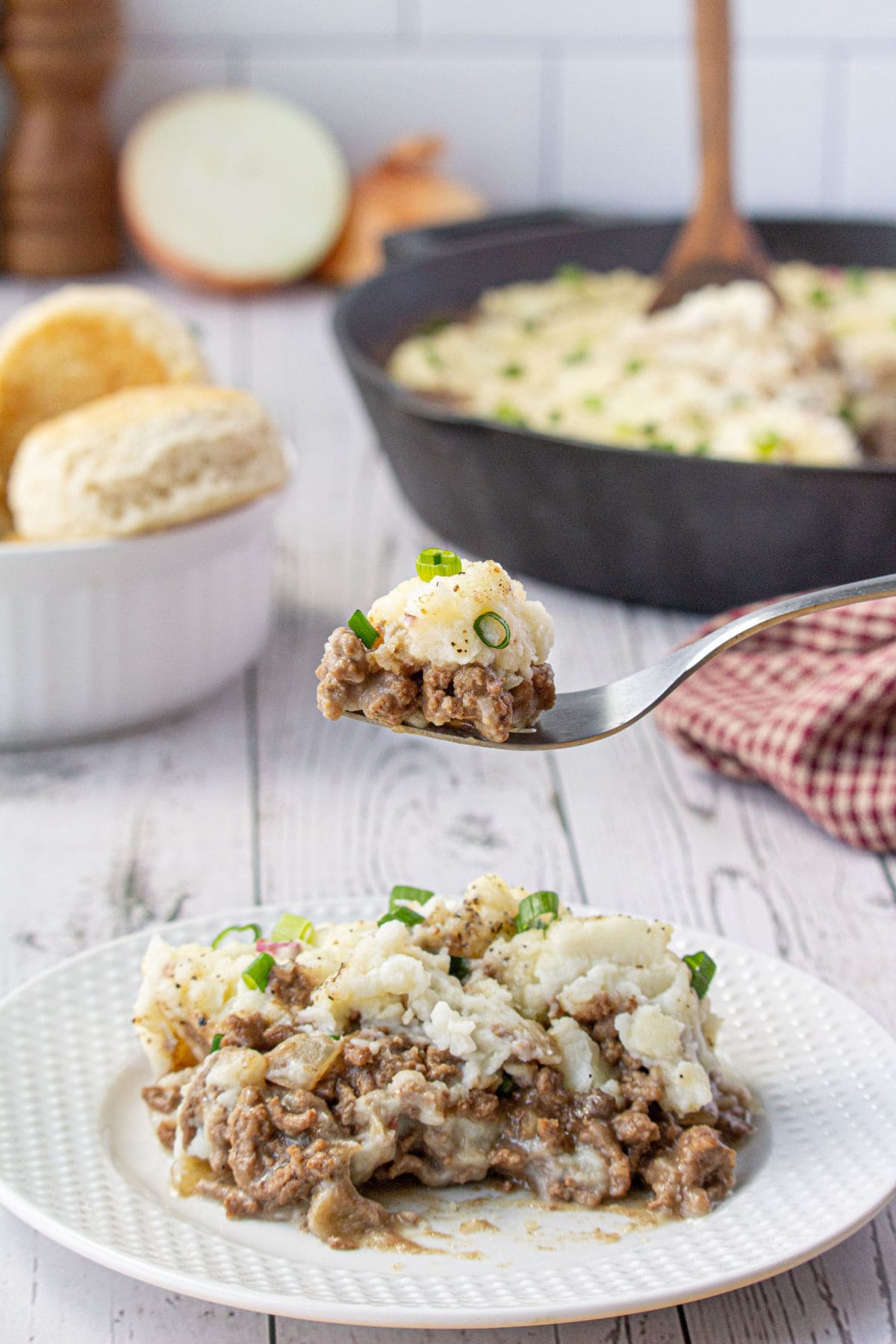 A serving of the casserole on a white plate.