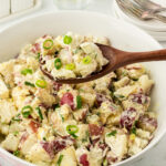 Closeup of a bowl of potato salad for feature image.