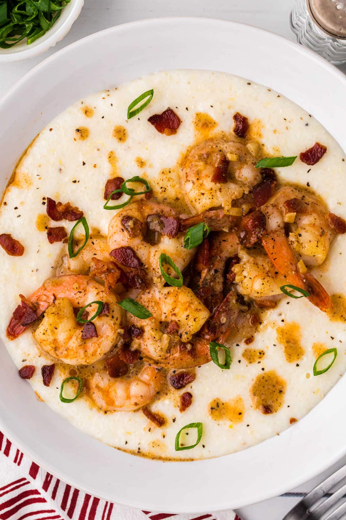 Overhead view of cajun shrimp and grits.