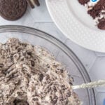 Closeup of Oreo cake filling with text overlay for Pinterest.