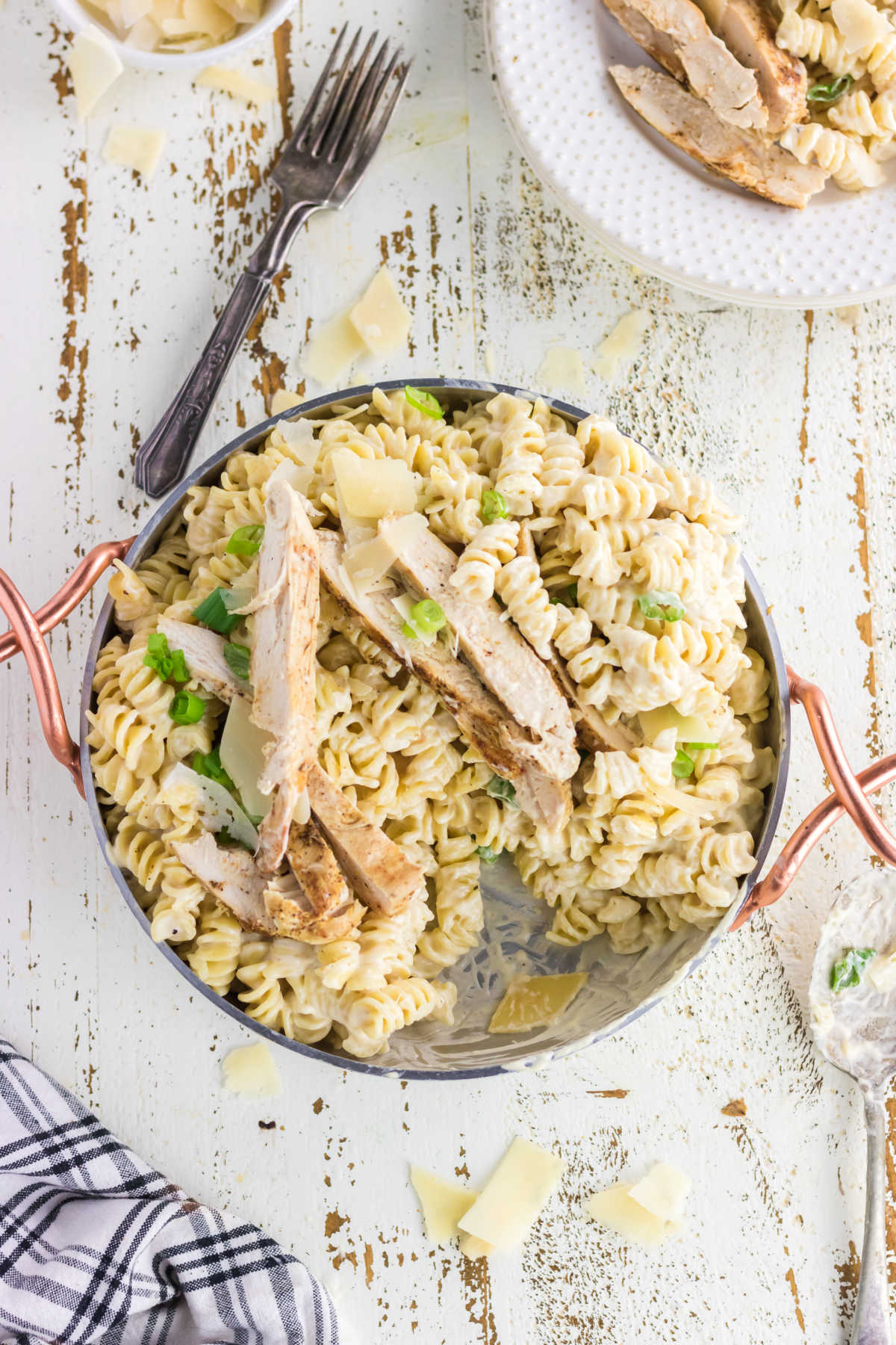 Overhead view of chicken alfredo in the serving dish.