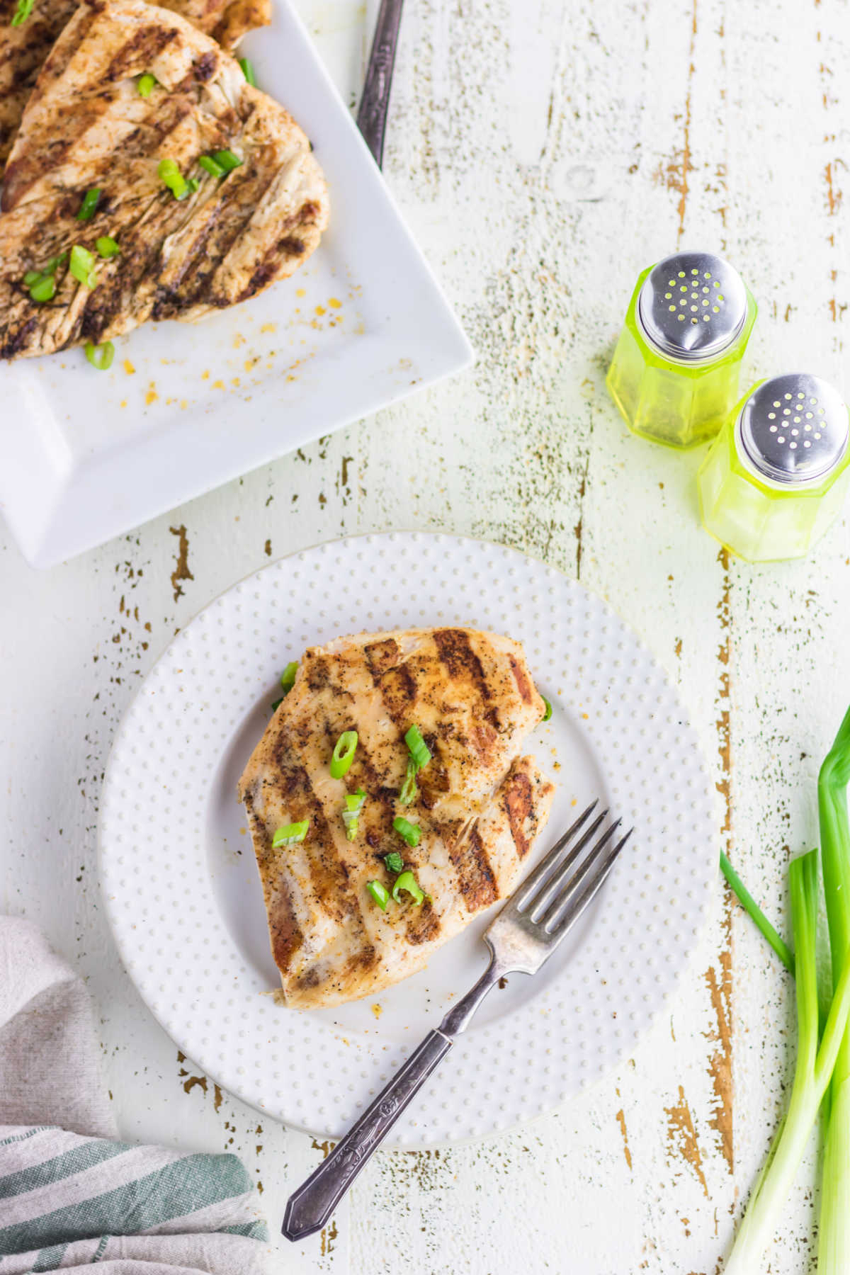 Chicken on a plate ready to eat.