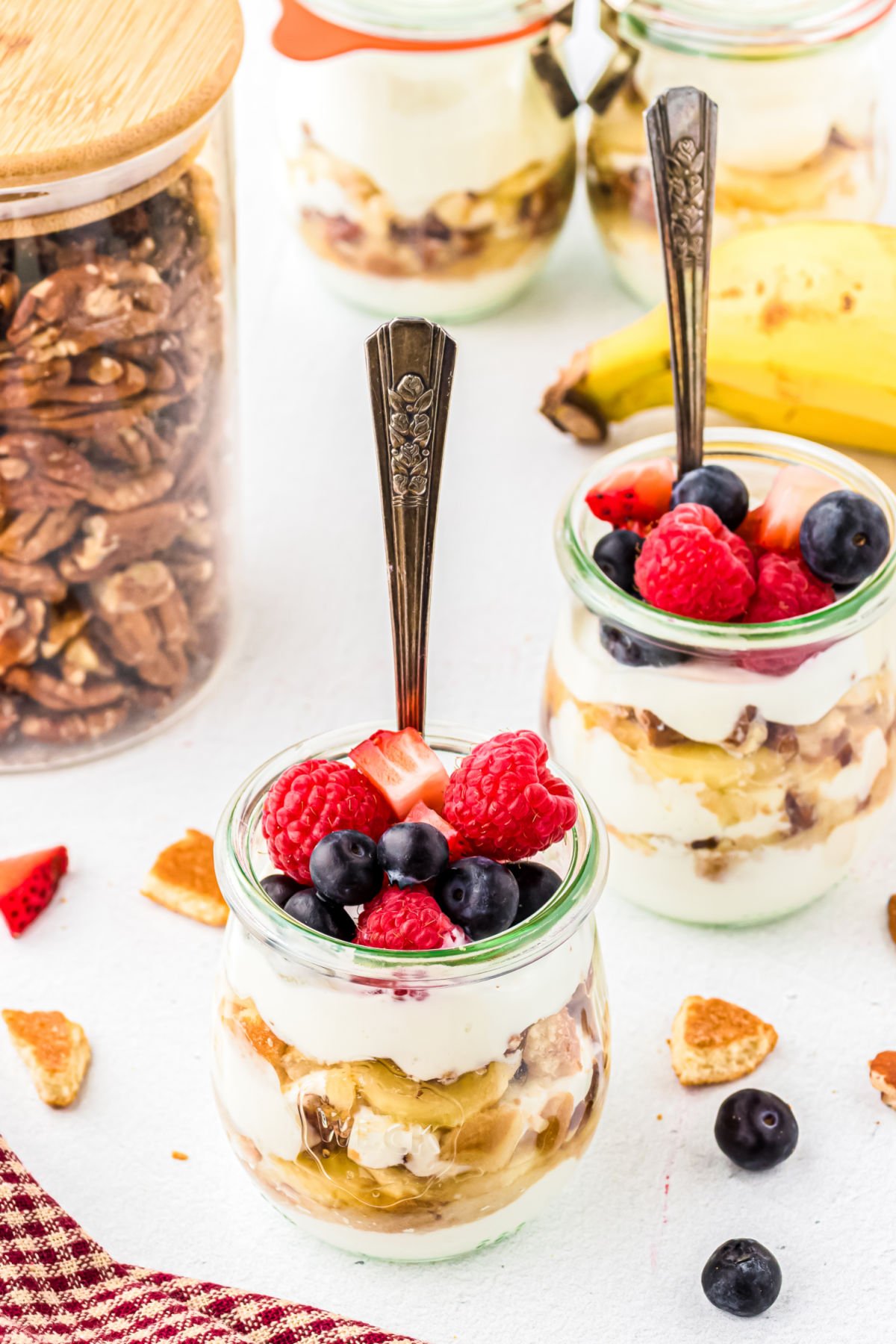 Yogurt parfaits with berries on top.