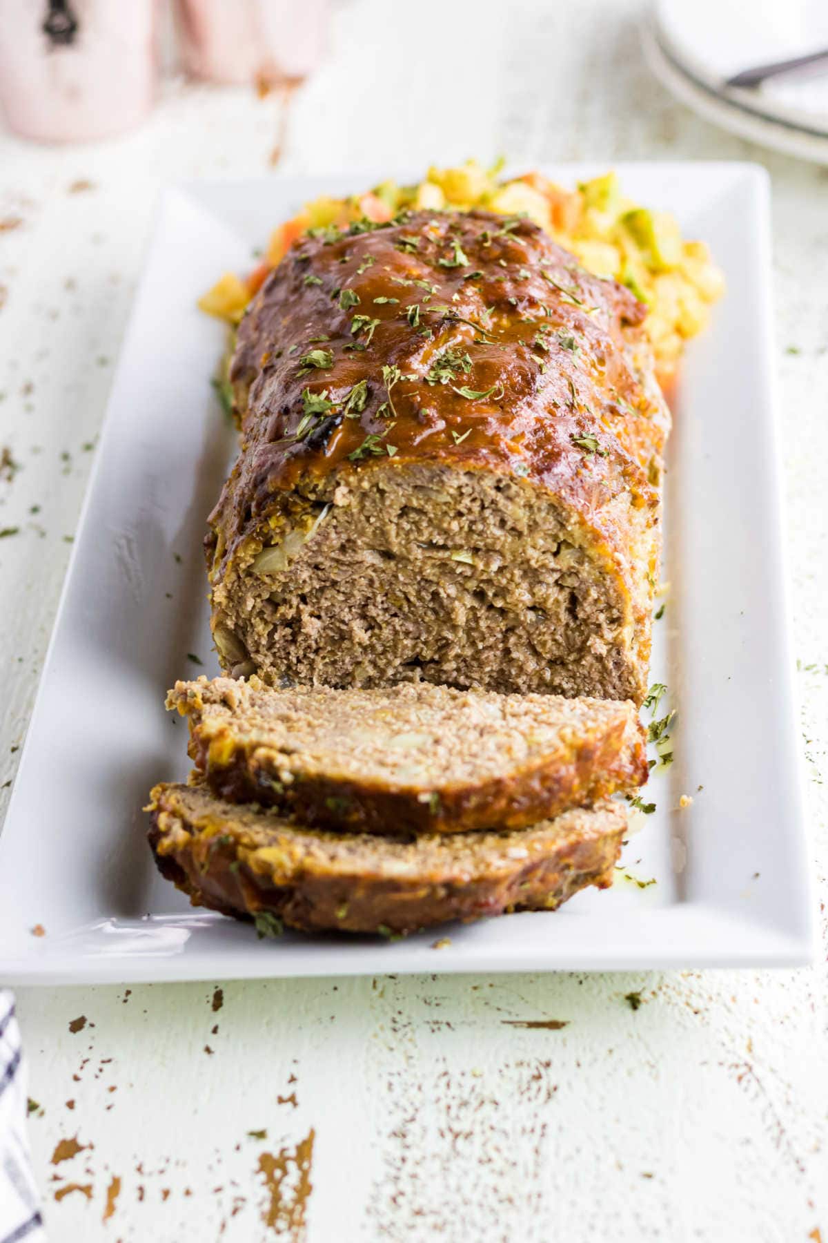 Finished meatloaf on a serving platter.