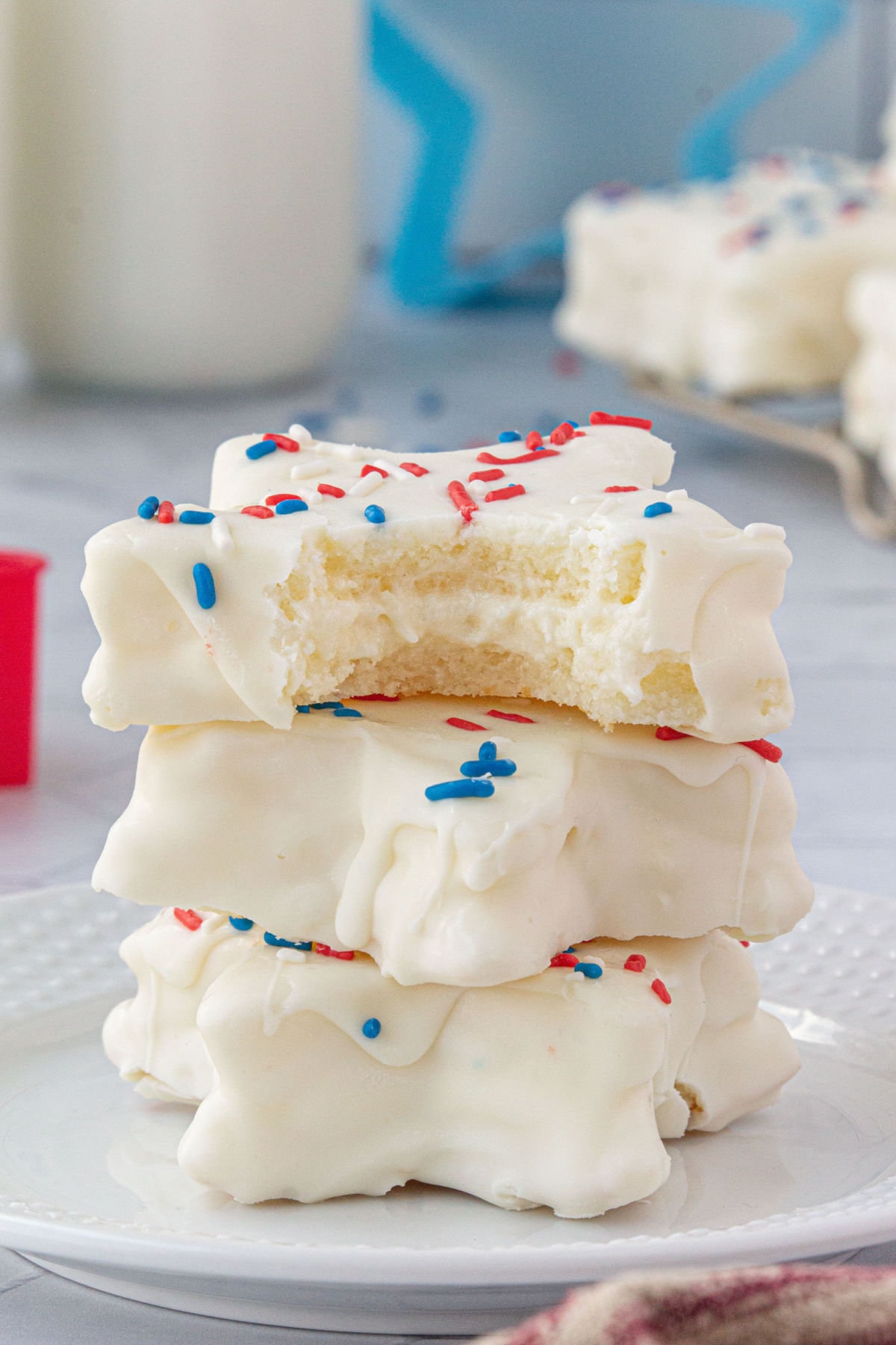 A stack of snack cakes cut in star shapes and decorated for the 4th of July.