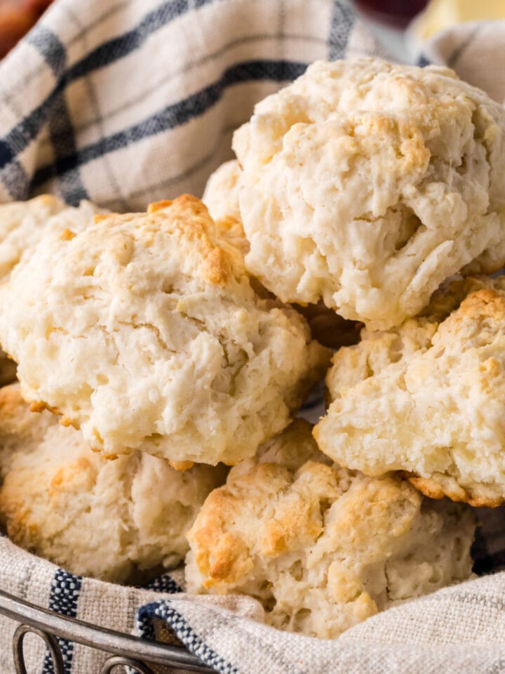 Close up of finished biscuits in a basket showing the bumpy texture.