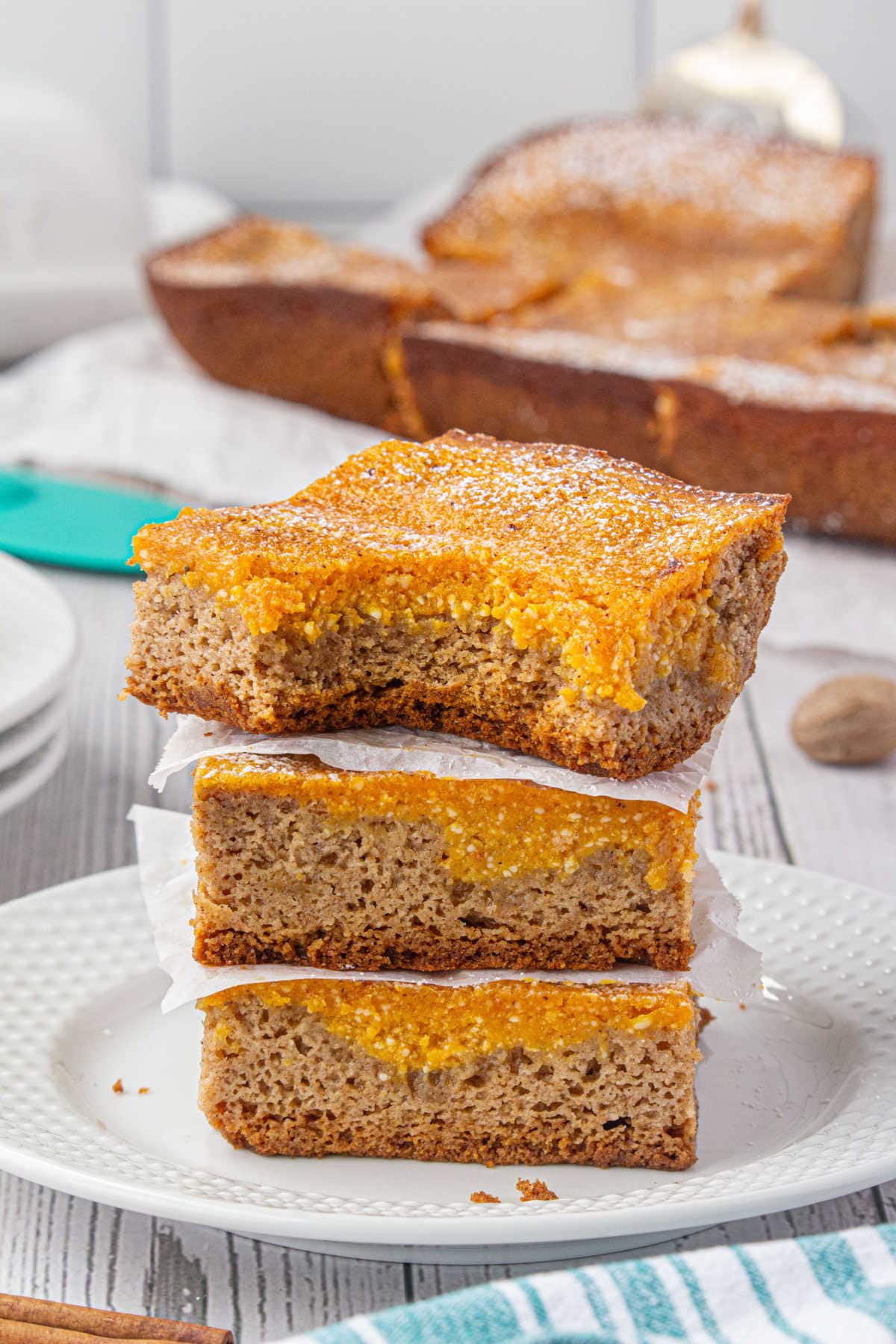 A stack of the bars with a bite out of the top one showing the layers.