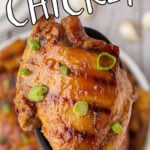 A spatula holding finished huli huli chicken with a text overlay for Pinterest.