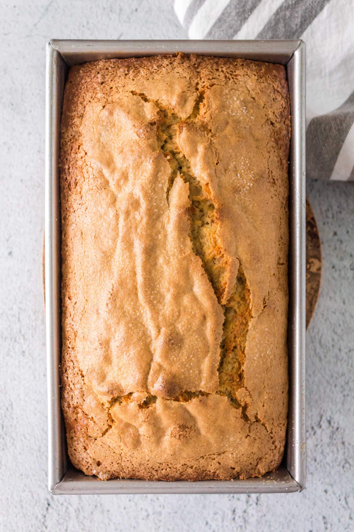 Overhead view of banana bread in a loaf pan.