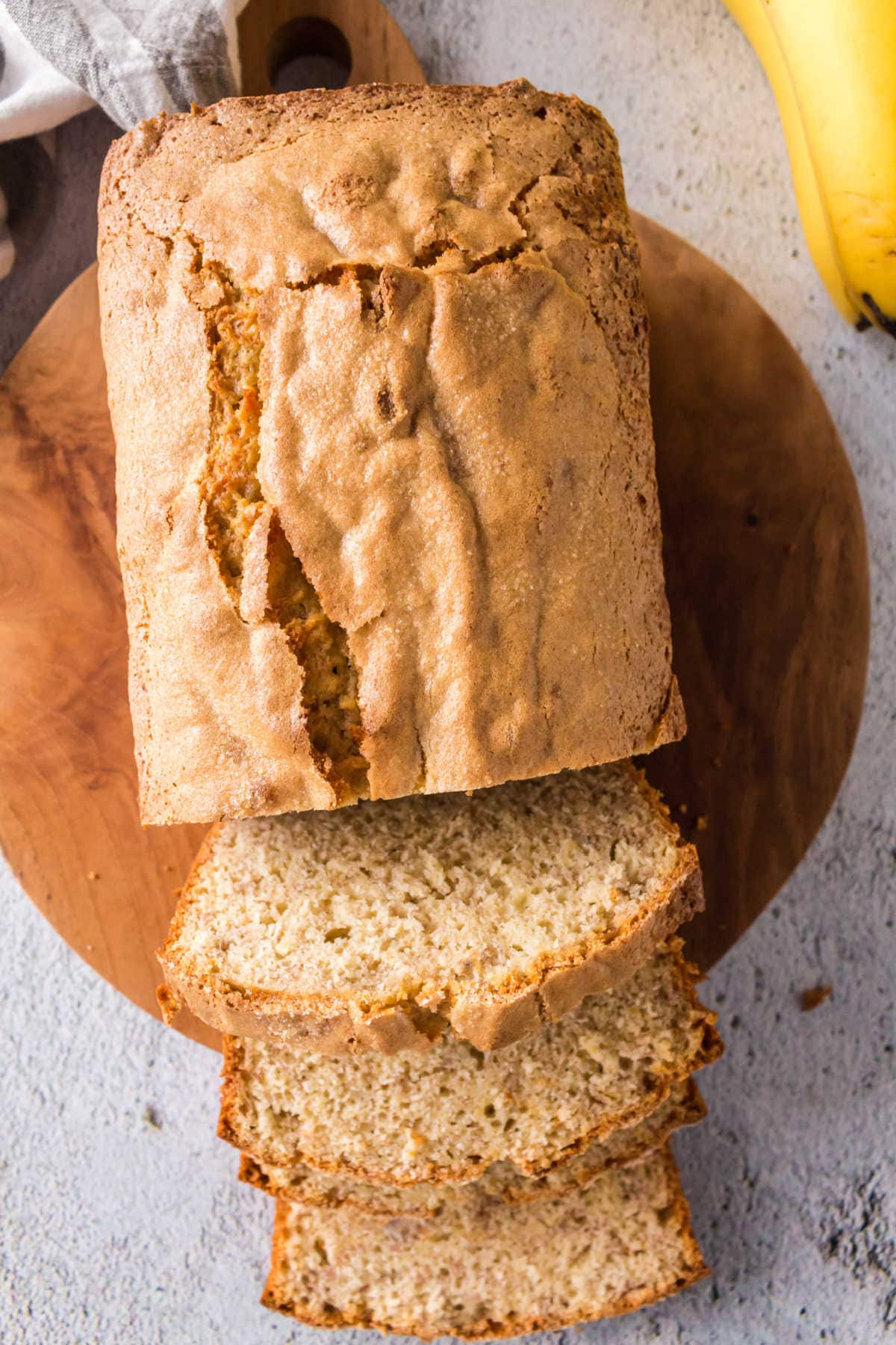 Banana bread slices on a cutting boar.