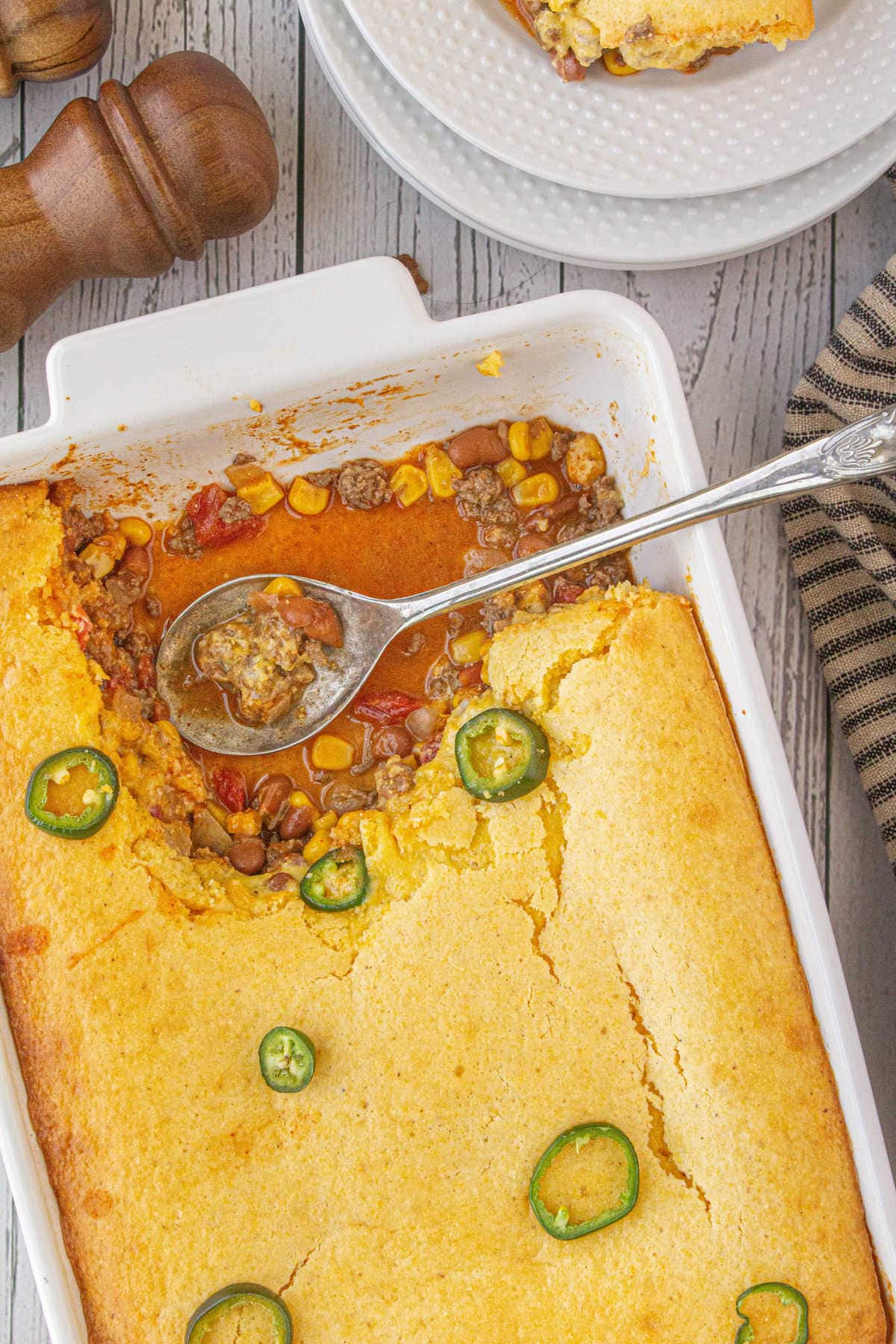 Overhead view of the casserole dish with a serving removed.