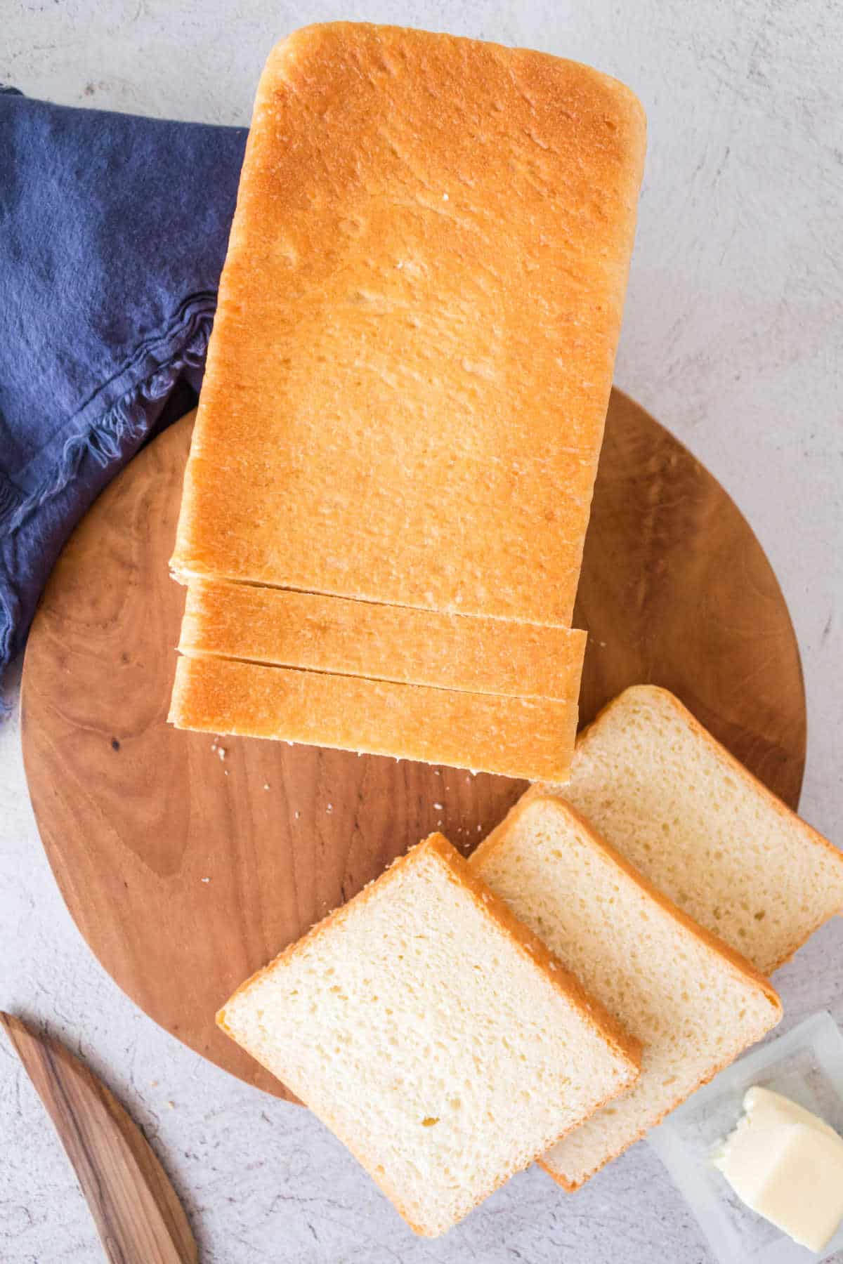 Overhead view of a loaf of pullman bread showing the golden crust.