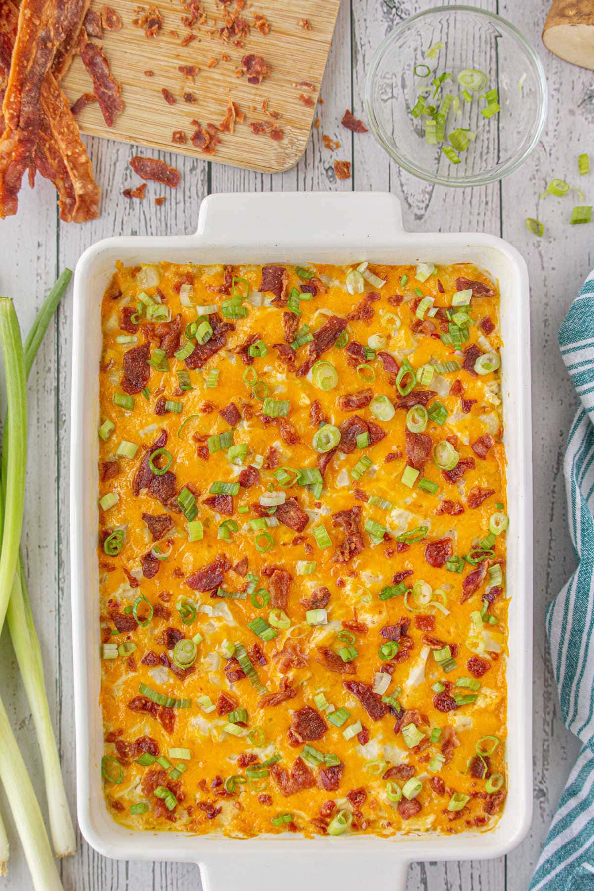 Overhead view of the bacon chicken casserole with gooey cheese topping.