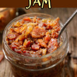 A jar of bacon onion jam on a wooden table with text overlay for pinterest.
