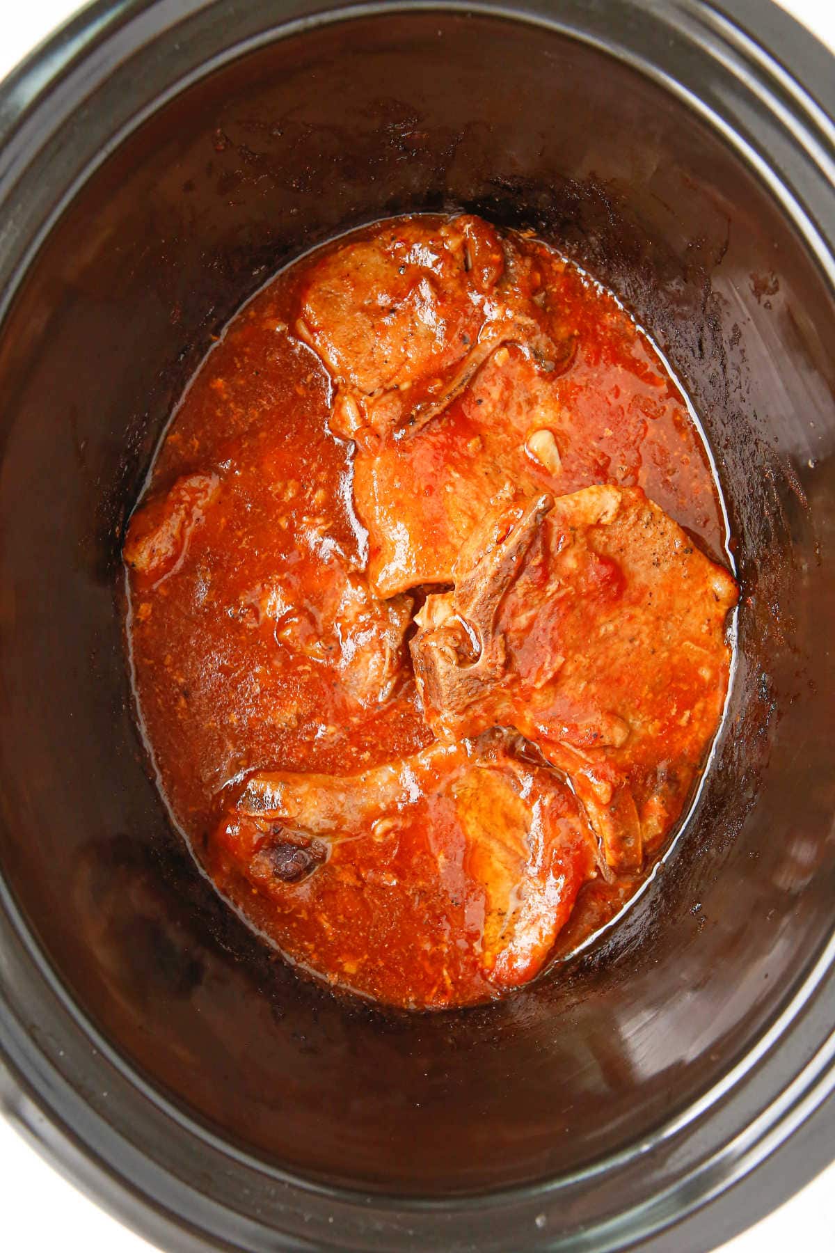Finished pork chops in the slow cooker.