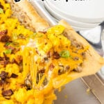 Finished breakfast pizza with title text overlay for Pinterest.