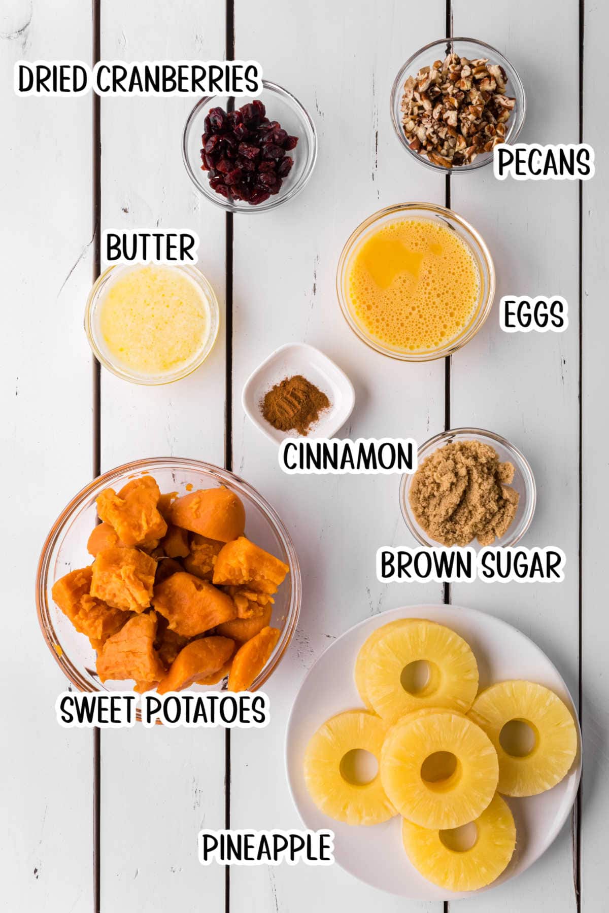 Ingredients for sweet potato pineapple casserole on a table.