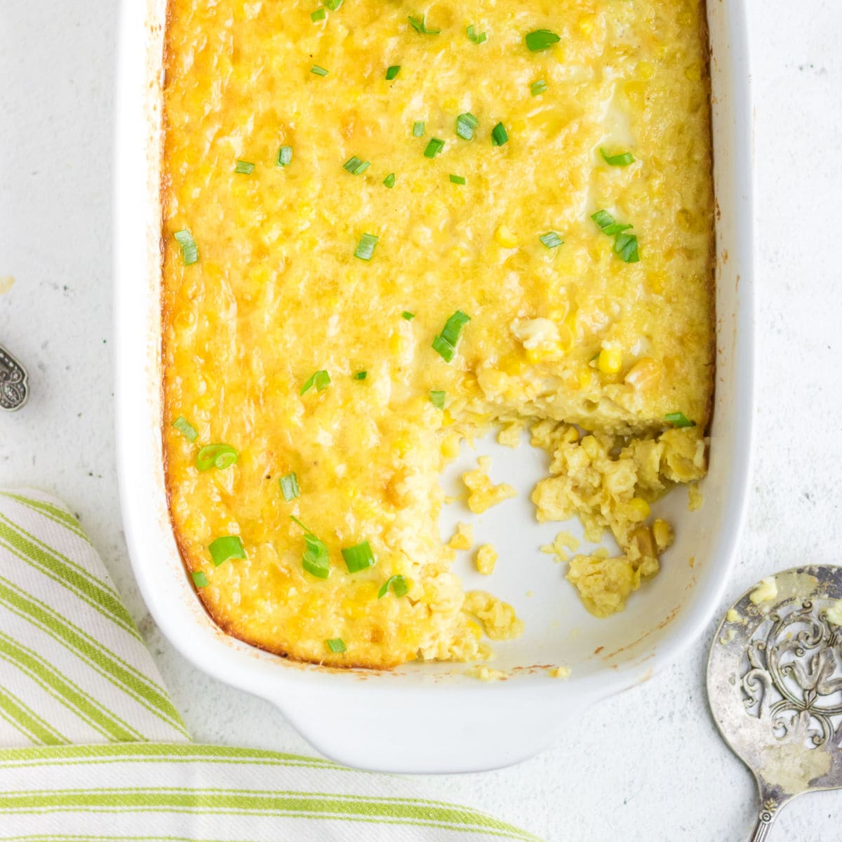 Overhead view of corn pudding in a casserole dish.