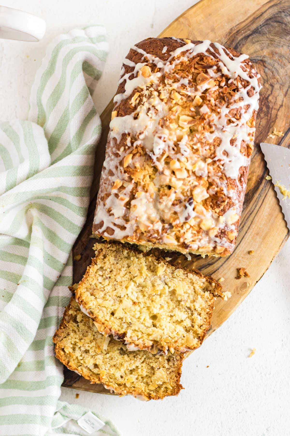 Overhead view of Hawaiian Banana Bread that's been glazed and sliced.