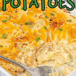 A dish of cheesy au gratin potatoes with a text overlay for Pinterest.