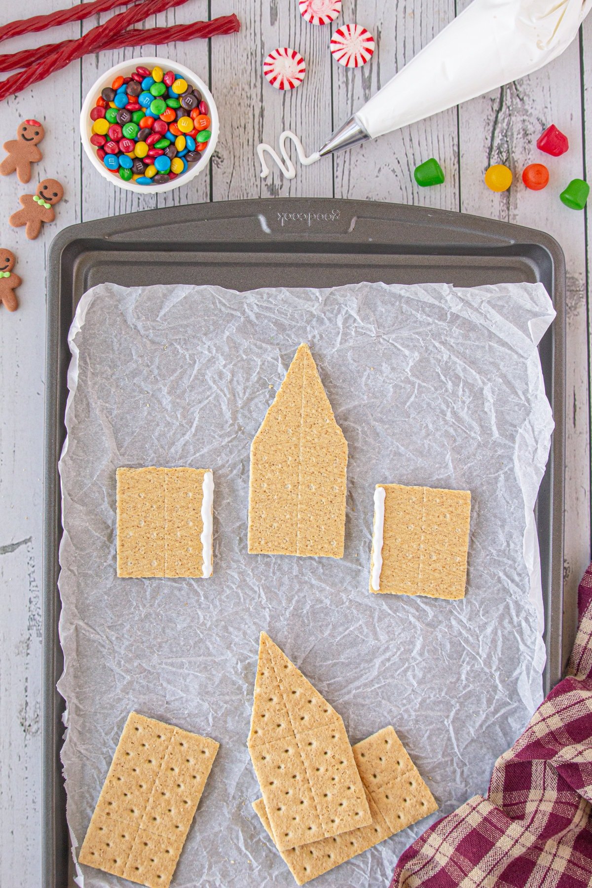 Smear a thick bead of icing down one side each piece.