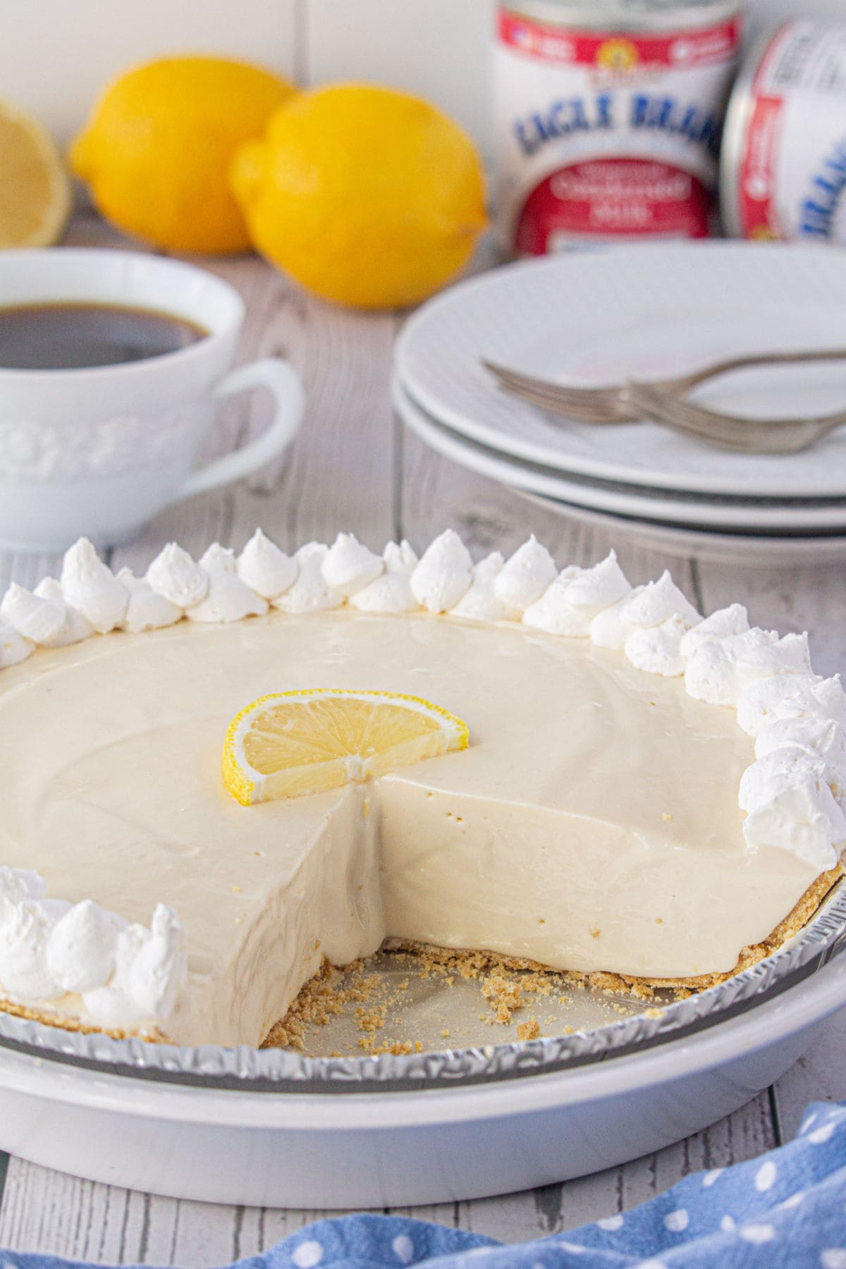 Lemon icebox pie with a slice removed.