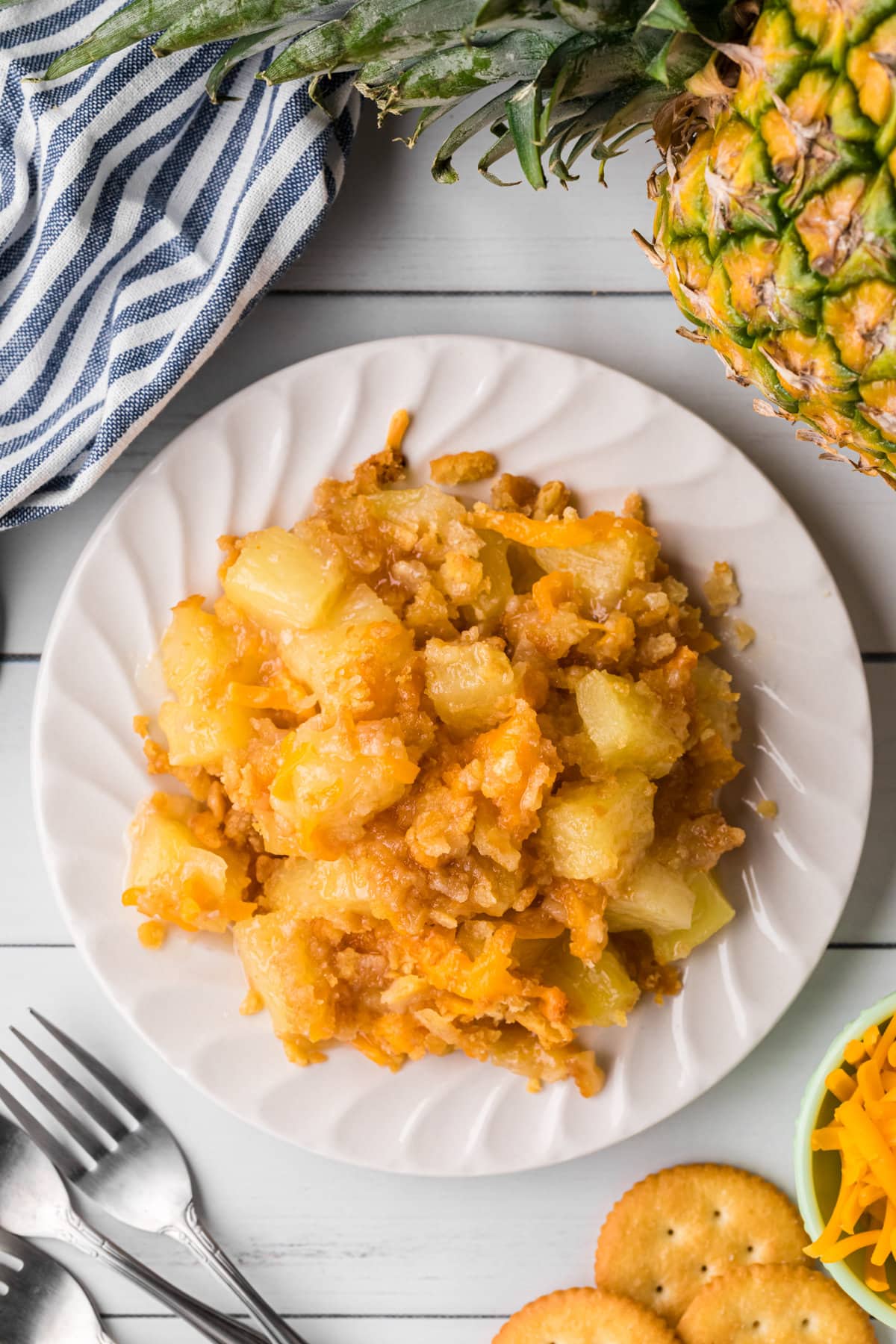Overhead view of pineapple casserole on a plate.