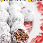 Closeup of a plate of Southern bourbon balls. One is cut open to show the texture inside. Title text overlay for Pinterest.
