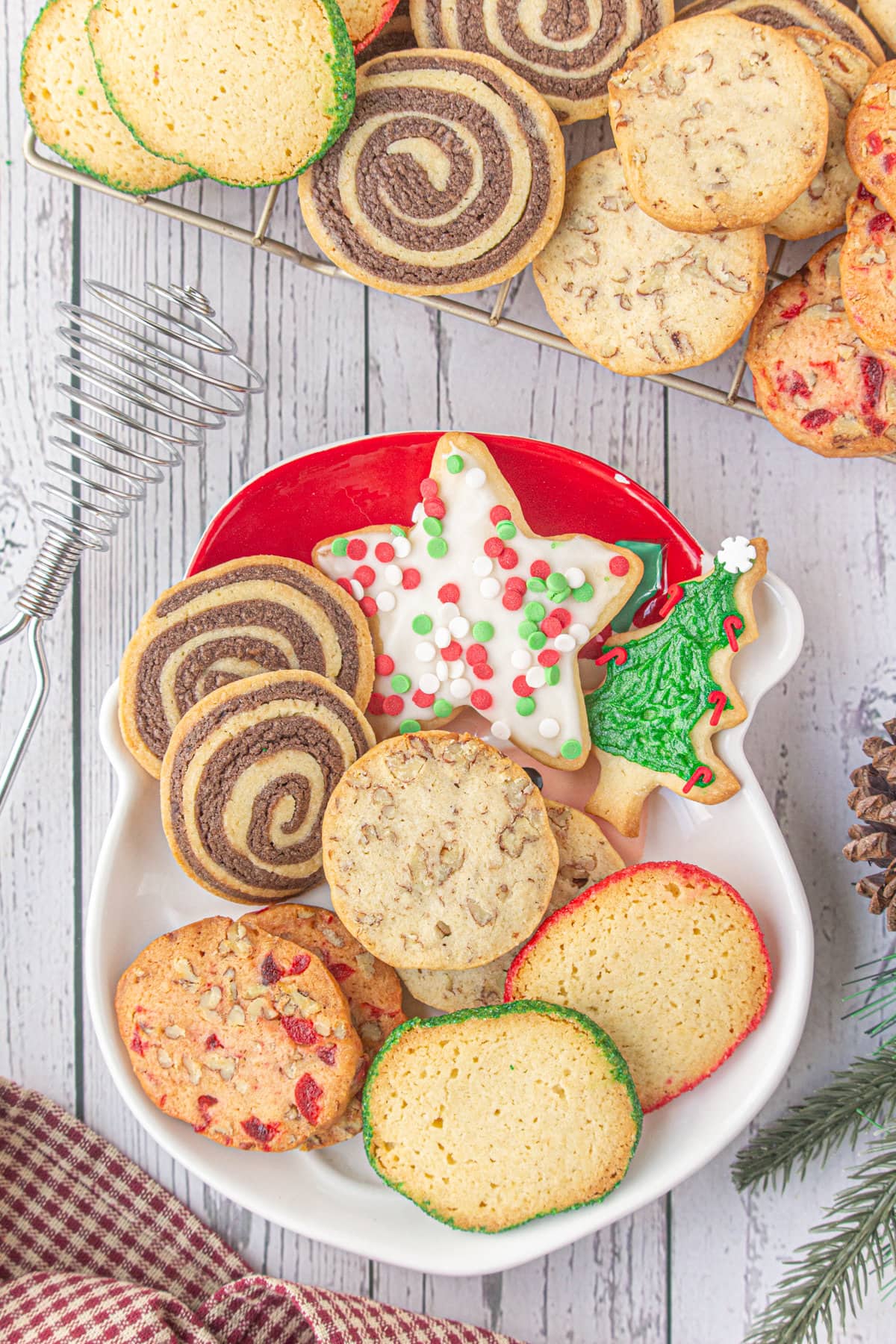 A plate full of holiday cookies.