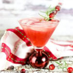 Closeup of cranberry daiquiri in a martini glass.