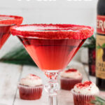 Red color martini in a stemmed glass with title text overlay for Pinterest.