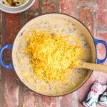 Add cheese to the cream sauce.