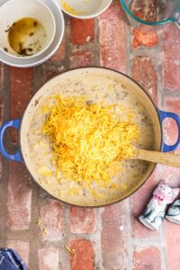 Add cheese to the cream sauce.