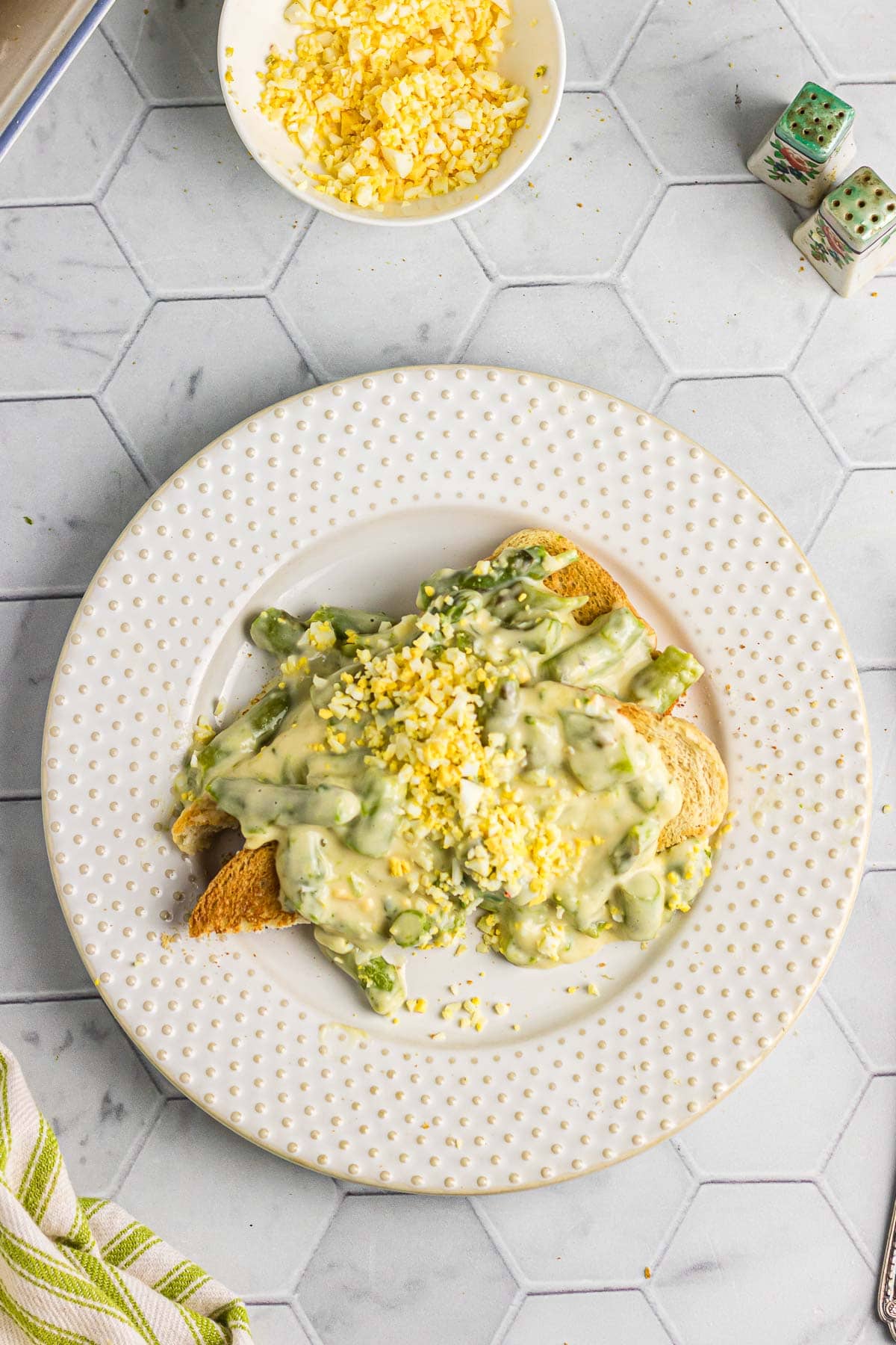 Overhead view of creamed asparagus on toast.