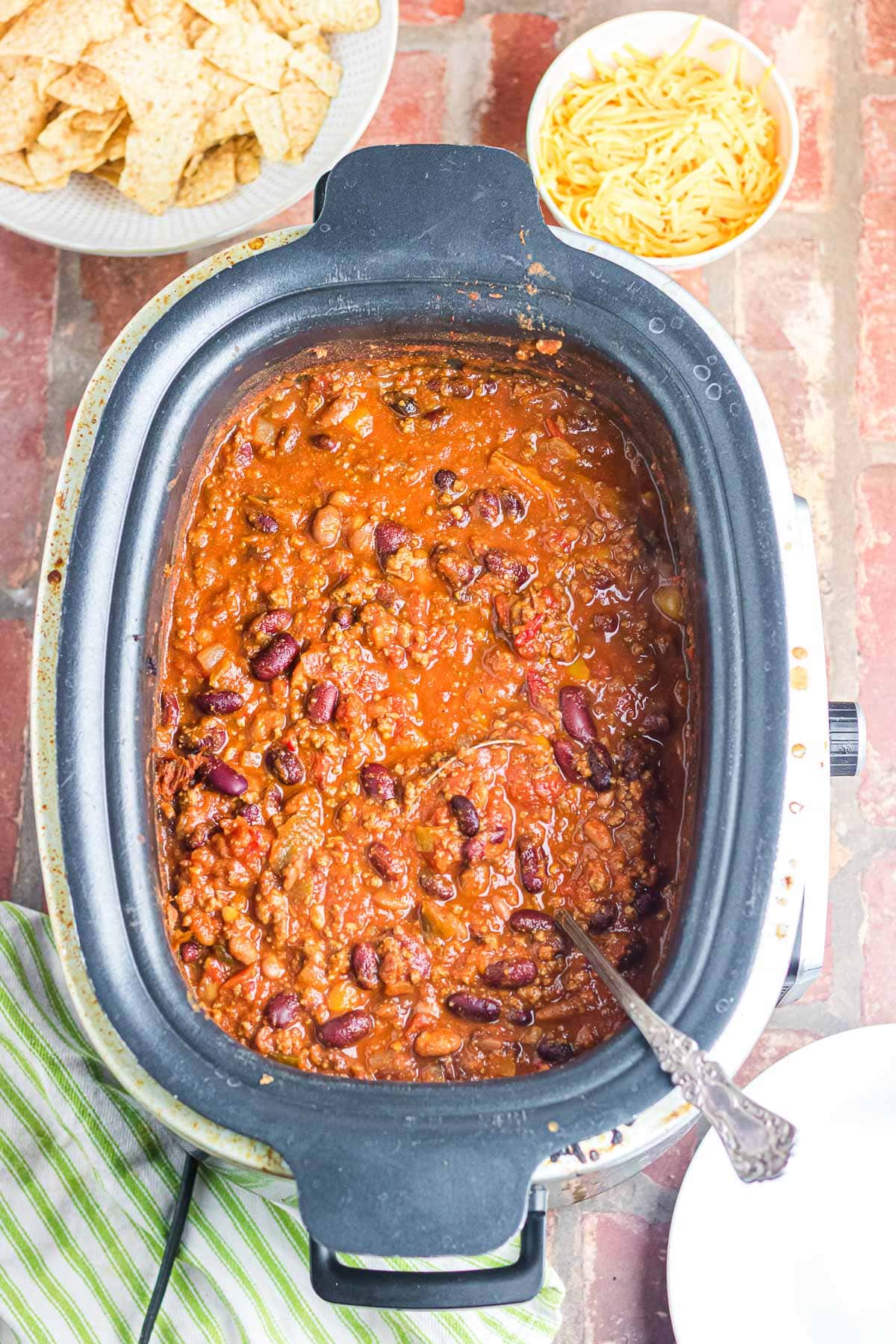 An overhead photo of a crockpot filled with chili.